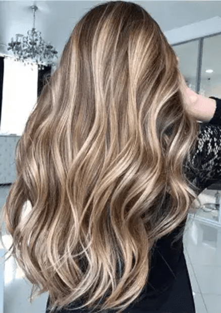 Coloration bronde sur cheveux longs